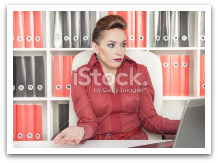 woman staring at computer